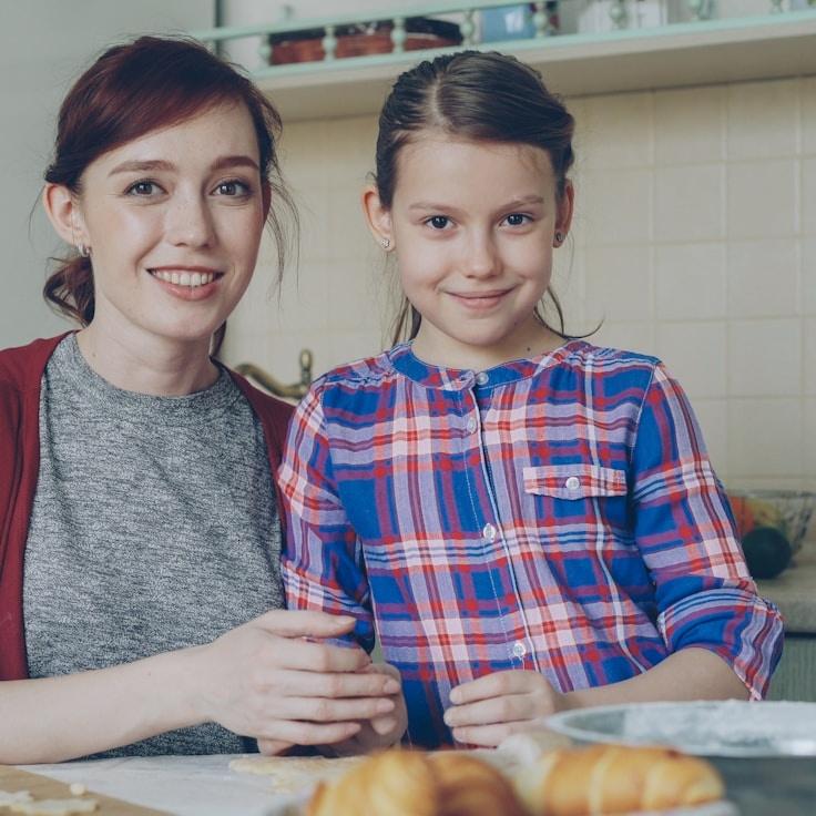 Kaveri Mehta, Lead Design Curator at Edenform Florals, reviewing corporate floral arrangements